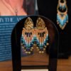 Petites boucles d’oreilles Nilyra Maria turquoise et bronze, bijou artisanal fait main pensé pour traverser le temps